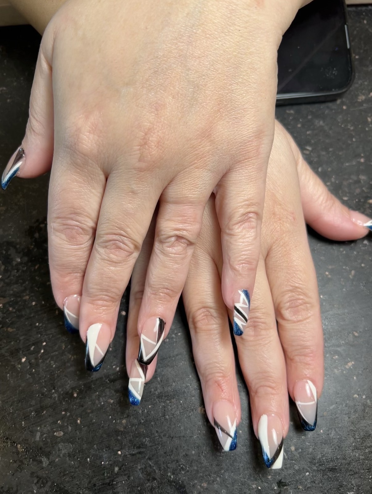 Blue geometric nail art